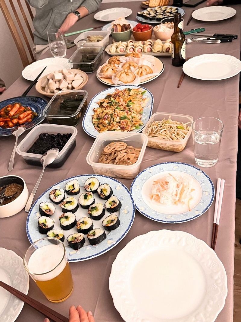 A table full of dishes on New Year's Eve in France, shared with friends
