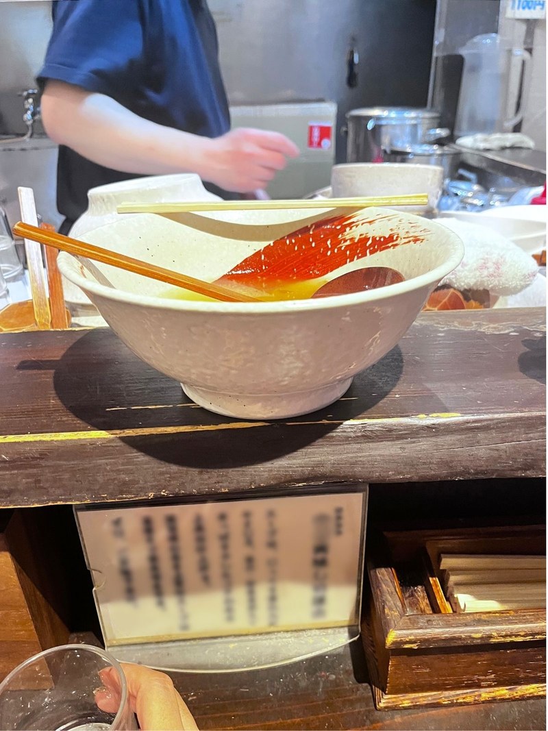 A finished bowl on the raised counter, with the kitchen just behind it