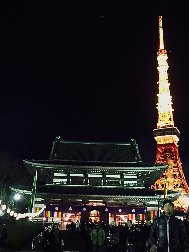 Zojoji Temple at night, with Tokyo Tower lit up behind it